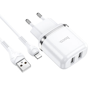 Hoco N4 Ladegerät Set, weiß, mit zwei USB-Anschlüssen und Lightning-Kabel für iPhones und iPads.