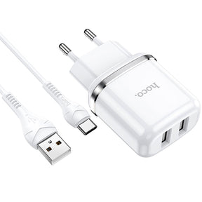 Hoco N4 Ladegerät Set, weiß, mit zwei USB-Anschlüssen und USB-C Kabel für schnelles und sicheres Laden.