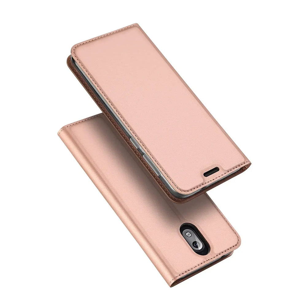 Rosafarbene Klapphülle aus Kunstleder für Nokia 3.1, von oben und unten gezeigt.