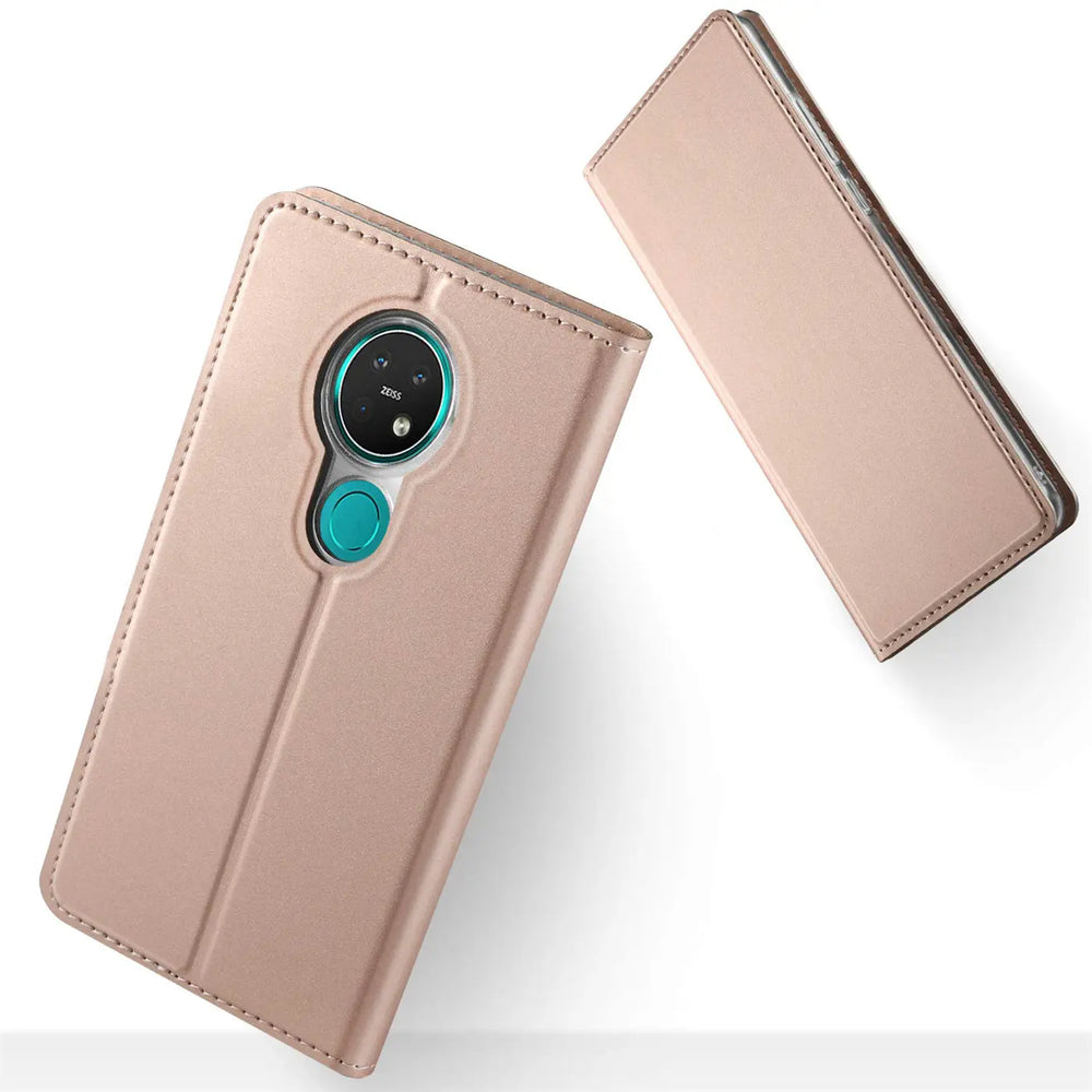 Rosafarbene Metallic-Flip-Hülle aus Kunstleder für Nokia 7.2, von oben schräg fotografiert.