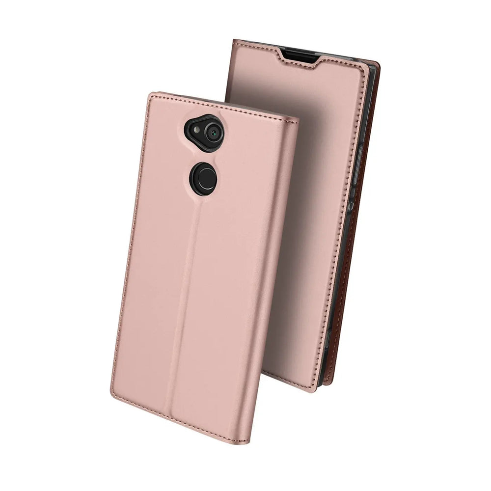 Rosé-goldene Metallic Flip Hülle aus Kunstleder für Sony Xperia XA2, schräg von hinten mit offener Klappe.