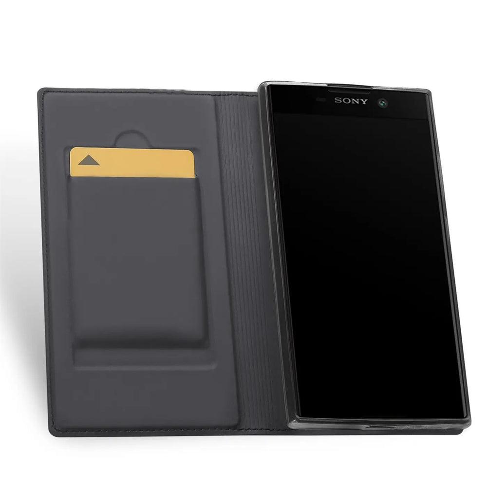 Graue Kunstleder Flip Hülle für Sony Xperia XA2, offen mit goldener Karte im Fach, von oben rechts.