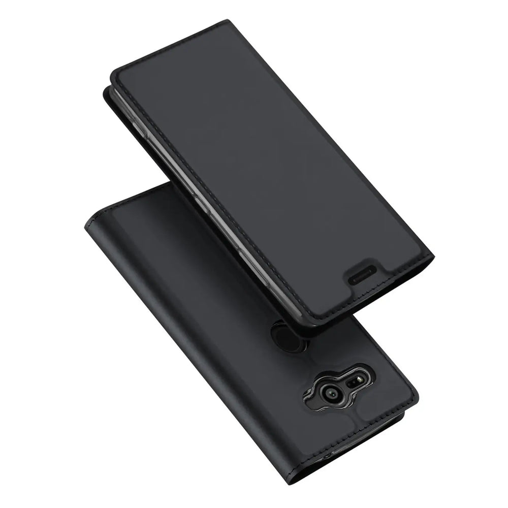 Schwarze, aufklappbare Metallic-Flip-Hülle für Sony Xperia XZ2 Compact, schräg von oben, offen liegend.