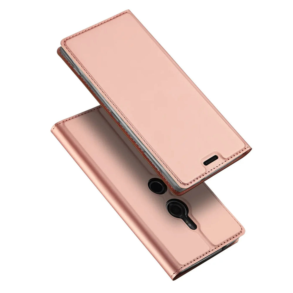 Roségoldene Metallic Flip Hülle für Sony Xperia XZ2, offen liegend, von oben schräg fotografiert.