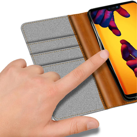 Huawei P20 Lite Klapphülle im Jeanslook mit Karten- und Geldfach