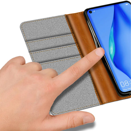 Huawei P40 Lite Klapphülle im Jeanslook mit Karten- und Geldfach