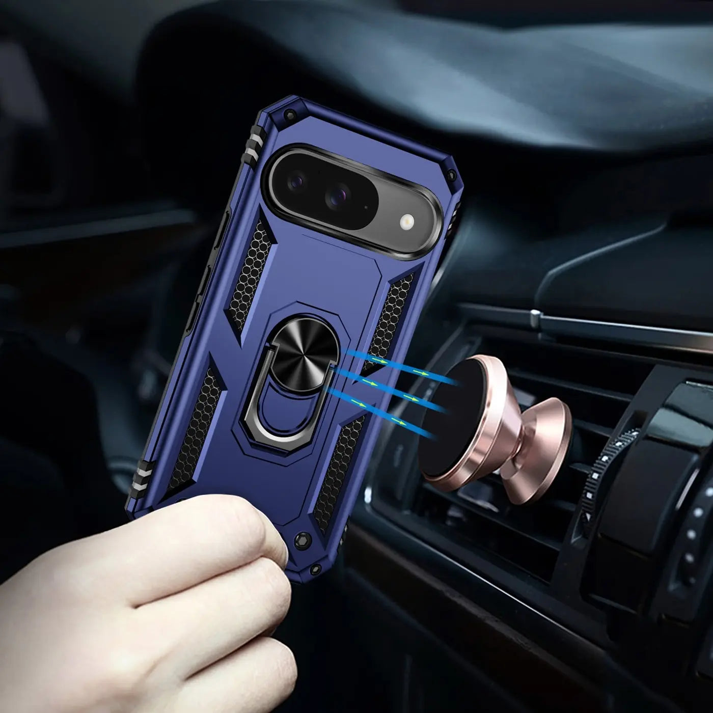 Hand hält blaues Google Pixel 10 mit Military-Hülle und Ringhalter, der an roségoldenem Lüftungsschlitz-Magnethalter haftet.