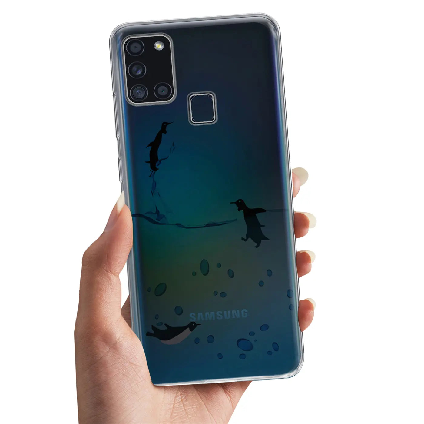 Samsung Galaxy A21s mit transparentem TPU-Case, Motivdruck Pinguine, von vorne gehalten