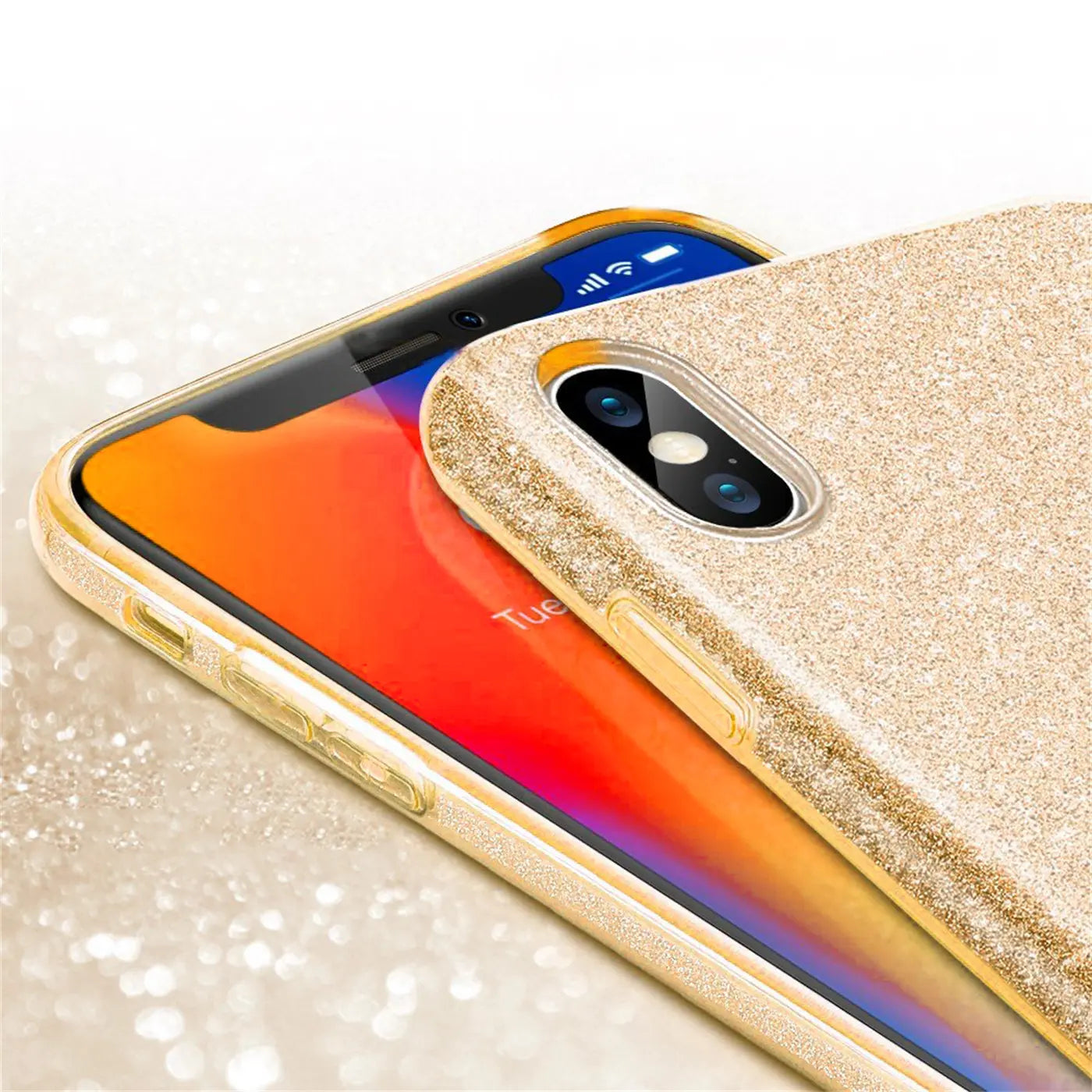 Goldfarbene Glitzer-TPU-Hülle auf iPhone X/XS, Nahaufnahme von oben rechts.