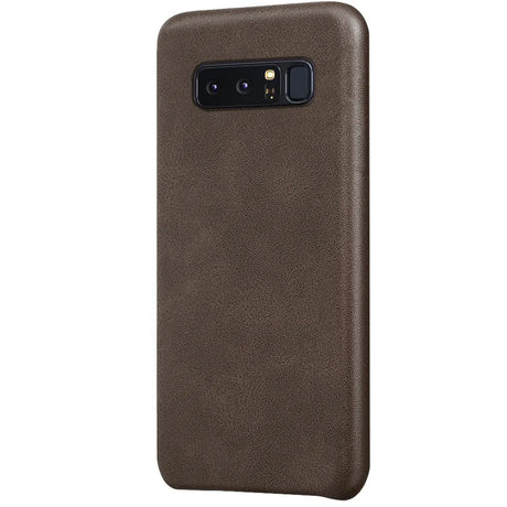 Hartschalen-Handyhülle mit Kunstleder-Außenseite in Schwarz, Braun oder Rot.