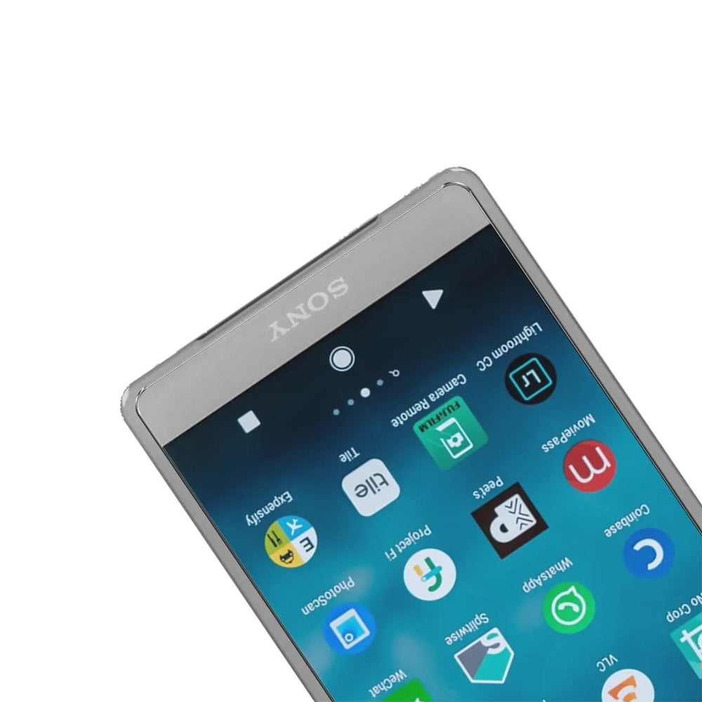 Silbernes Sony Xperia XZ2 Compact Smartphone, schräg von oben, mit Display-Apps und Panzerglas-Displayschutz.